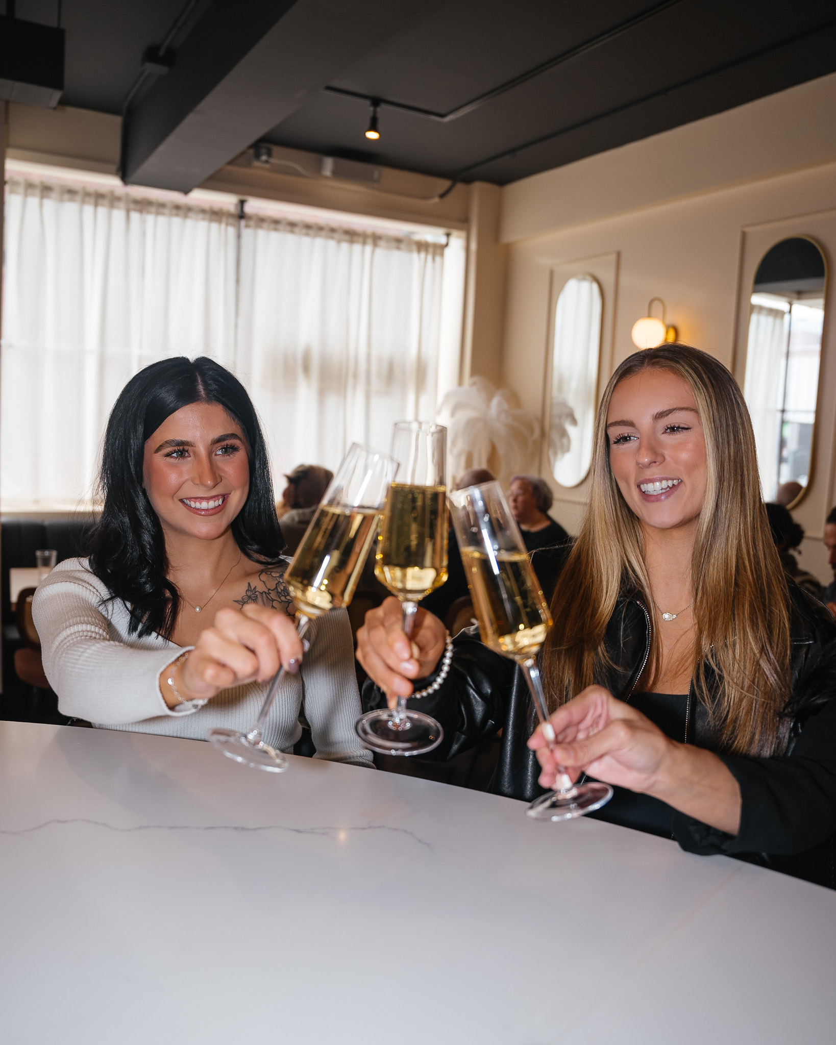 Champagne pouring into a coupe